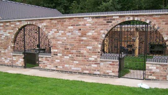 single gates on brick alcoves
